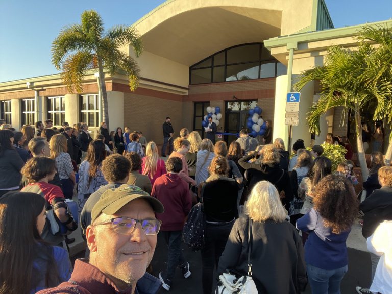 Shop owners talking over coffee in a small room — networking events in Pinellas Park